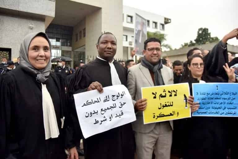 عبد النباوي والداكي يقنعان المحامين بإنهاء احتجاجات “الجواز الصحي”